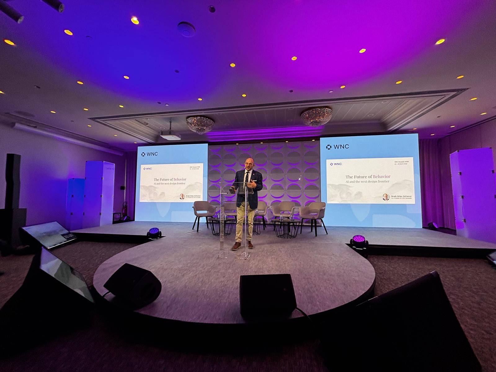 Brady speaking at WNC Brussels